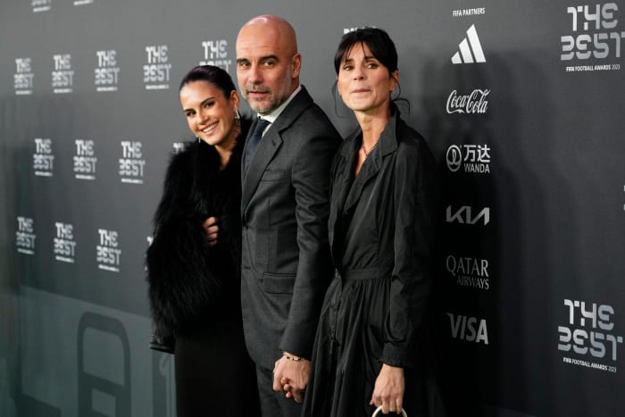 Manchester City manager Pep Guardiola pictured (center) at The Best FIFA Football Awards 2023 alongside his wife Cristina Serra (right) and their daughter Maria (left)